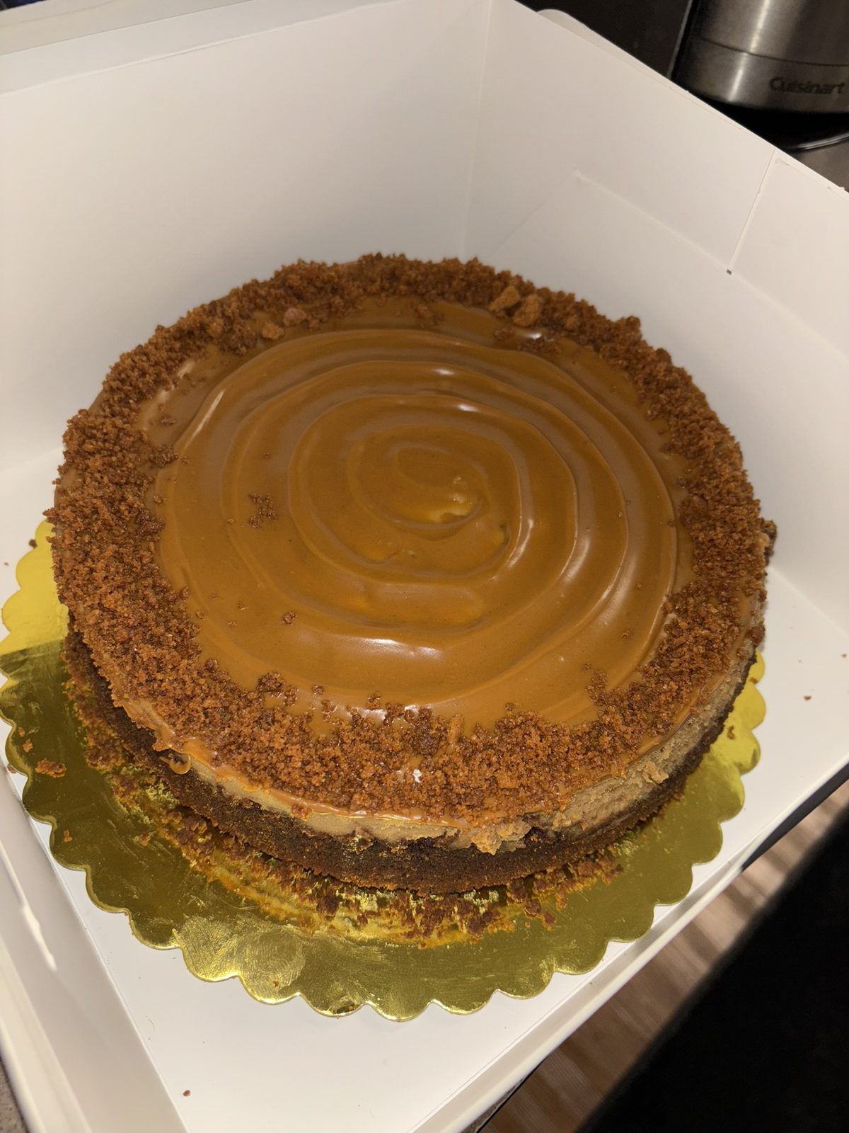 Biscoff cheesecake topped with cookie butter and speculoos crumb