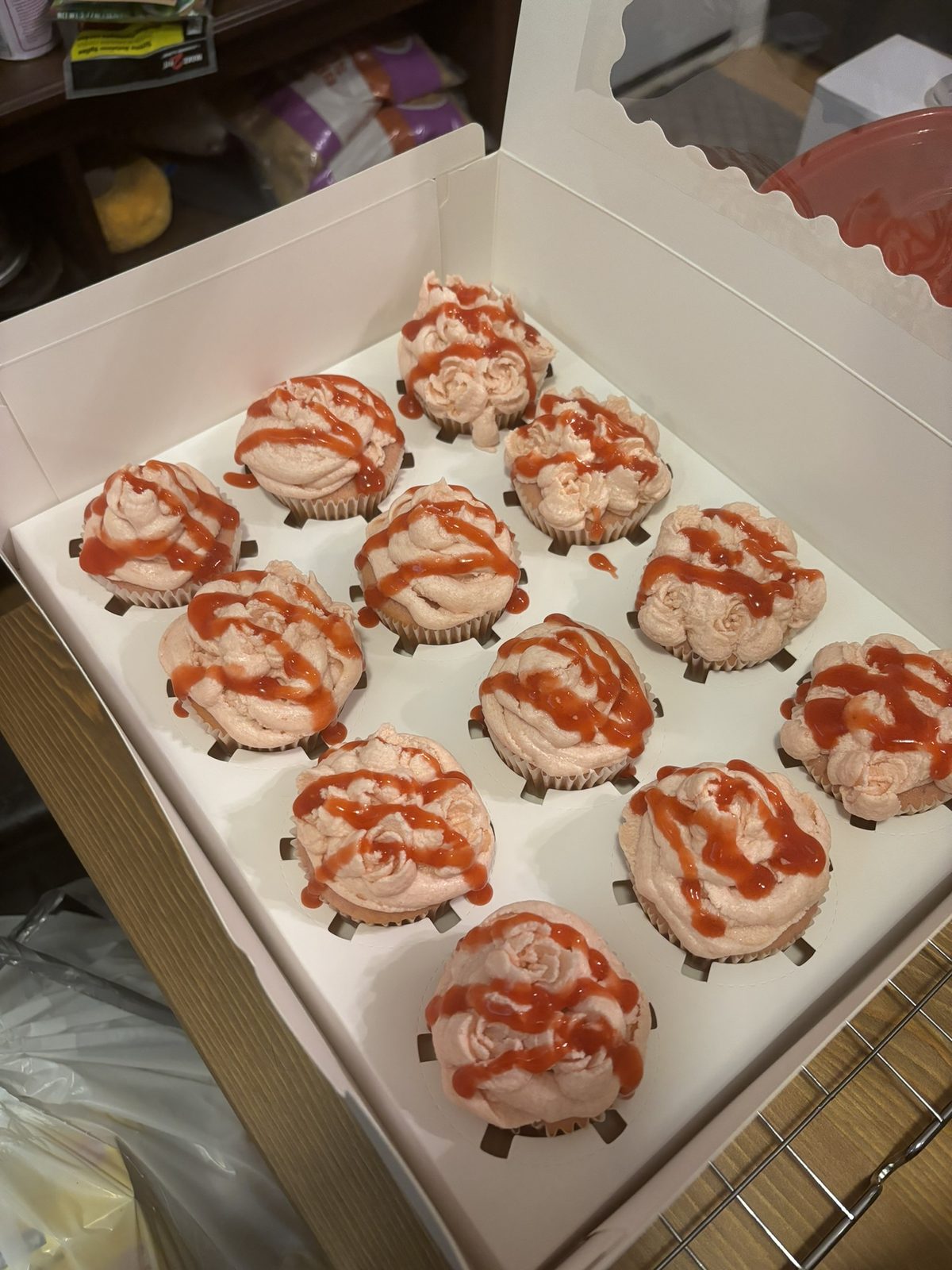 Strawberry cupcakes with berry drizzle